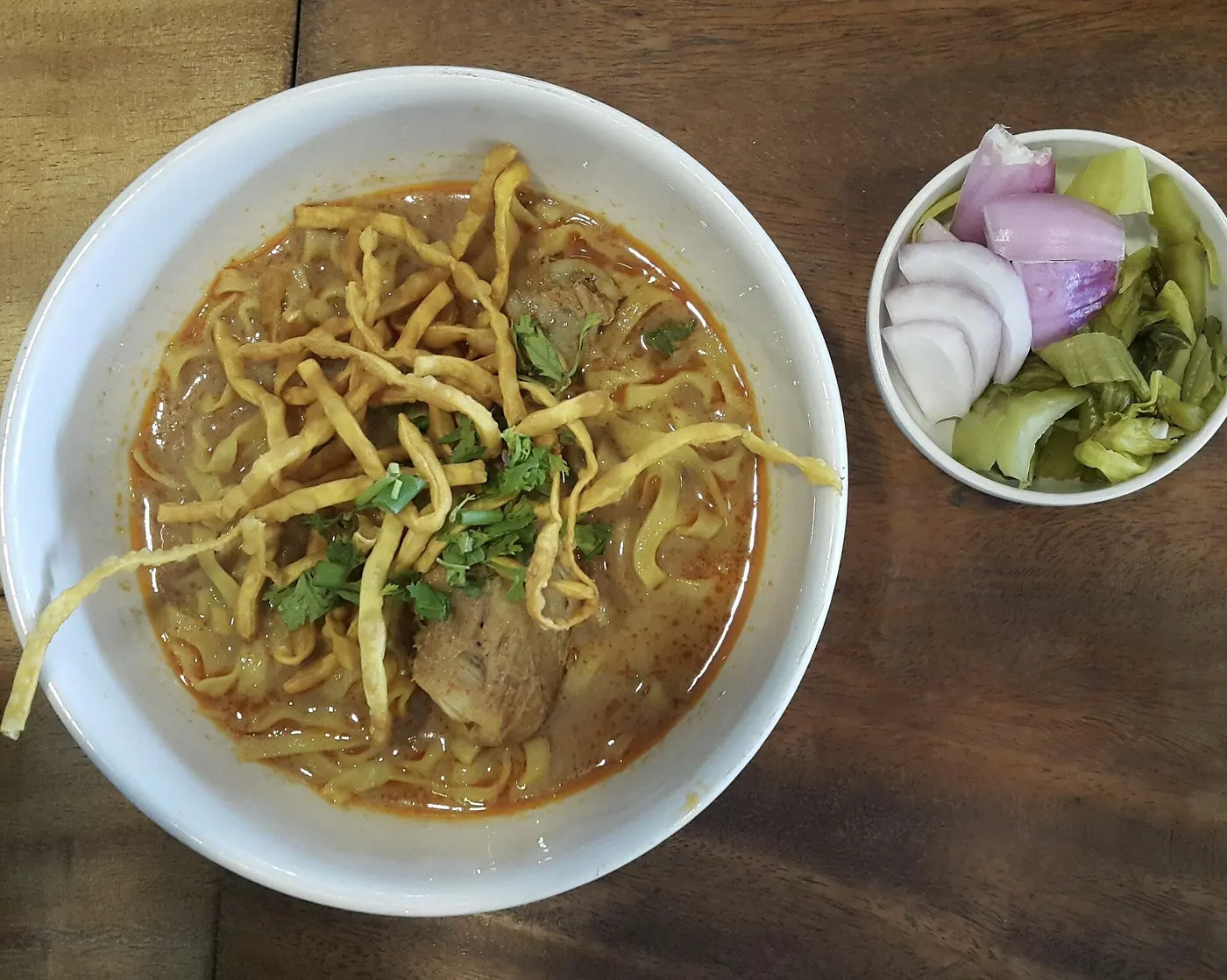Khao soi Northern Thai curry noodles with pickled mustard greens