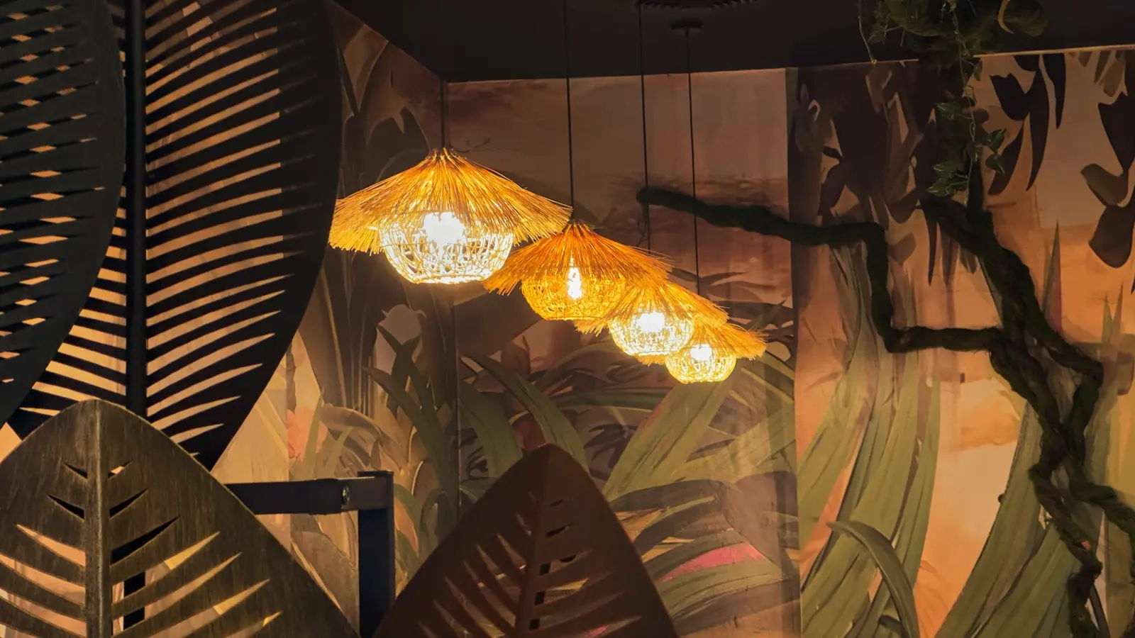 Rattan lanterns and tropical murals at Elephant Ear Thai restaurant, 690 9th Ave NYC Rattan lanterns and tropical murals at Elephant Ear Thai restaurant, 690 9th Ave NYC