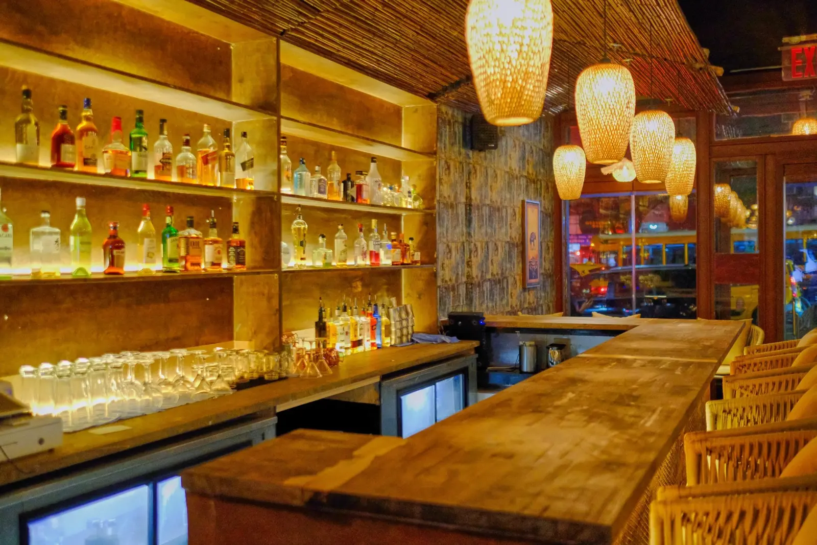 Bar shelves in golden light at Elephant Ear Thai, Hell's Kitchen Bar shelves in golden light at Elephant Ear Thai, Hell's Kitchen
