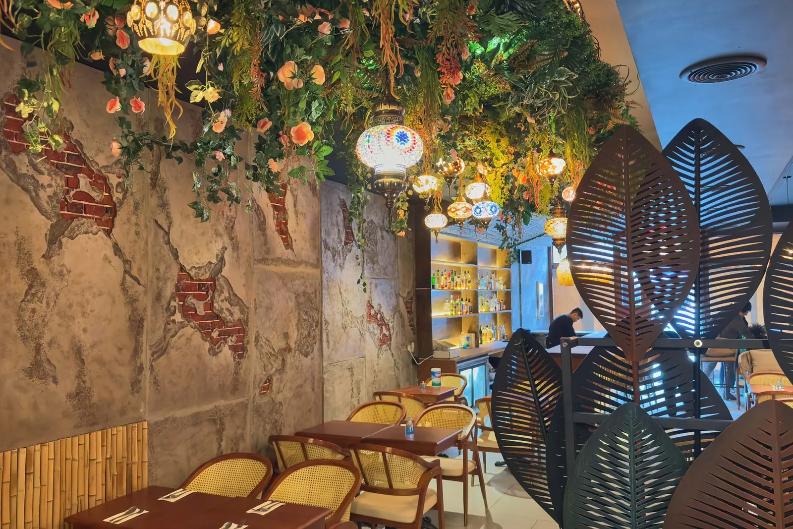 Thai Wood Carvings at Elephant Ear Thai wood carving wall and dining tables at Elephant Ear restaurant NYC